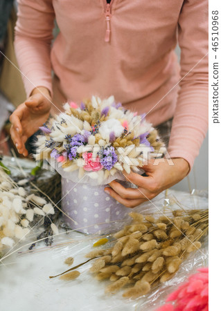 The process of making a bouquet. Colorful bouquet of different dried flowers deadwood flowers in the 46510968