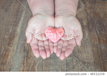 Оrgan donation, help someone. Adult woman hand Оrgan donation, help someone. Adult woman hand 46512239