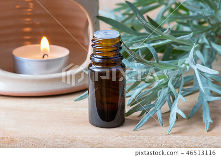 A bottle of wormwood essential oil 46513116