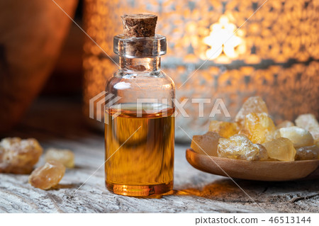 A bottle of frankincense essential oil and resin A bottle of frankincense essential oil and resin 46513144