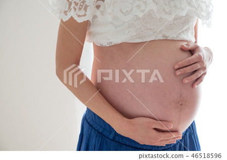 Pregnant woman pregnant stomach maternity late pregnancy Pregnant woman pregnant stomach maternity late pregnancy 46518596