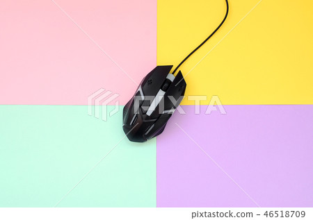 Optical mouse is located between areas of different colors Optical mouse is located between areas of different colors 46518709