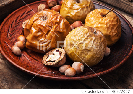 Baked apples with nuts Baked apples with nuts 46522007
