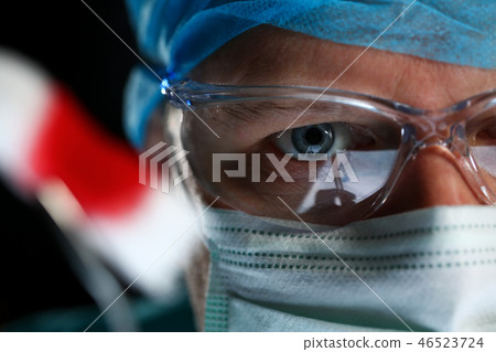 Handsome male physician face wearing protective mask 46523724