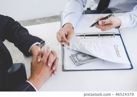 Bribery and corruption concept, bribe in the form of dollar bill Bribery and corruption concept, bribe in the form of dollar bill 46524379