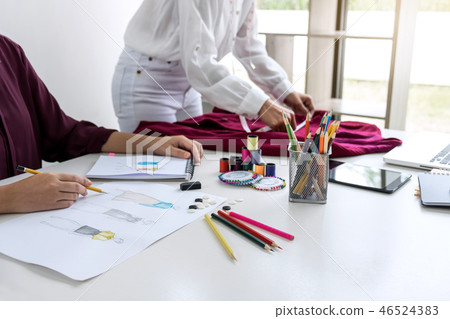 Two professional stylish fashion designer working as fashion des 46524383