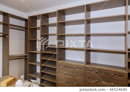 Large with in closet with many shelves and drawers. Large with in closet with many shelves and drawers. 46524690