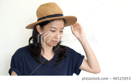 MIxed race asian woman wearing hat MIxed race asian woman wearing hat 46525953