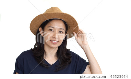 Casual friendly asian girl wearing hat relaxing  46525954