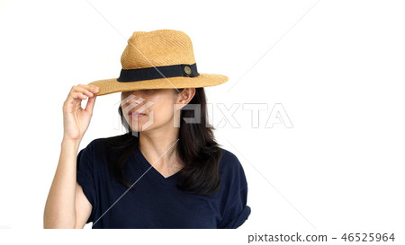 Asian girl hiding face under panama hat 46525964