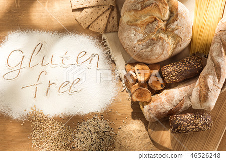 Gluten free food. Various pasta, bread and snacks on wooden background from top view 46526248