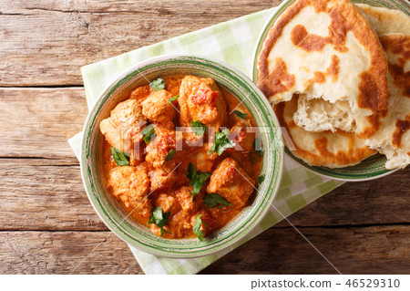 Indian food spicy karhai chicken in tomato sauce 46529310