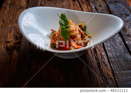 Glass noodles with mushrooms and vegetables.  46531111