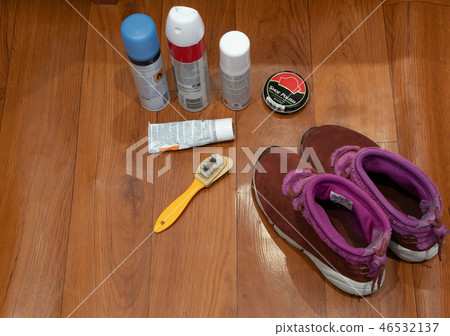 pair of woman suede shoes with cleaning stuff pair of woman suede shoes with cleaning stuff 46532137