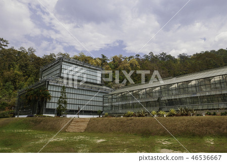 glasshouse in daytime in rural area for relaxation 46536667
