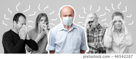 Horizontal portrait of several men and women having flu. Men in the middle wearing special mask Horizontal portrait of several men and women having flu. Men in the middle wearing special mask 46542287