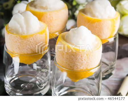 Lemon sorbet ice cream served dessert 46544177