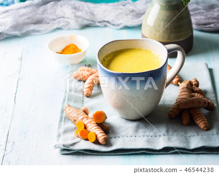 Golden turmeric milk drink in mug 46544238
