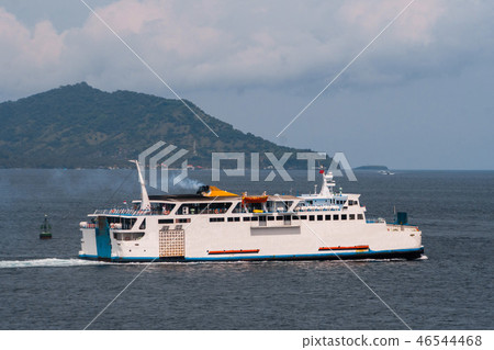 Cruise ship, Ferry sailing in the ocean against the shore Cruise ship, Ferry sailing in the ocean against the shore 46544468