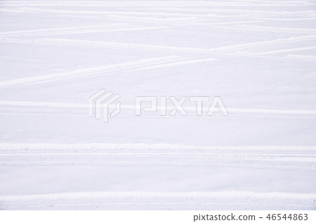 Traces of intersecting arcs of automobile tires in fresh snow Traces of intersecting arcs of automobile tires in fresh snow 46544863