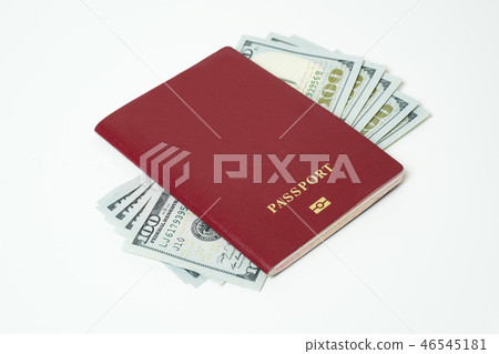 Foreign biometric passport with dollars isolated on a white background. Five bills for a hundred 46545181