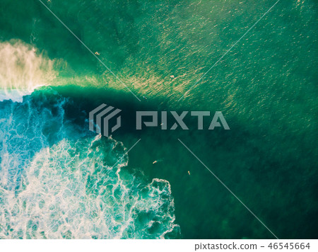 Aerial view of surfing at big waves. Surfers Aerial view of surfing at big waves. Surfers 46545664