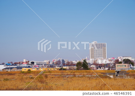 Cityscape towards Tachikawa Station from the Tama River Cityscape towards Tachikawa Station from the Tama River 46546391