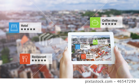 Augmented reality marketing concept. Hand holding tablet use AR application Augmented reality marketing concept. Hand holding tablet use AR application 46547299