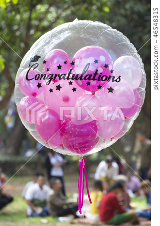 Floating balloon in university .Congratulations. 46548315
