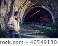 a man out in a tunnel 46549130