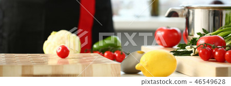 Cherry tomatoes lie on a cutting board Cherry tomatoes lie on a cutting board 46549628