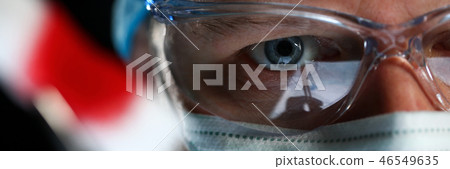 Handsome male physician face wearing protective mask 46549635