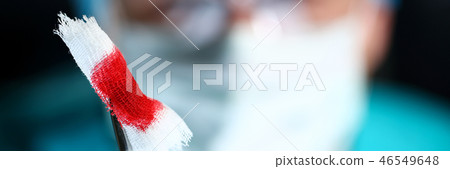Surgeon in sterile uniform arms holding tools with bio material Surgeon in sterile uniform arms holding tools with bio material 46549648