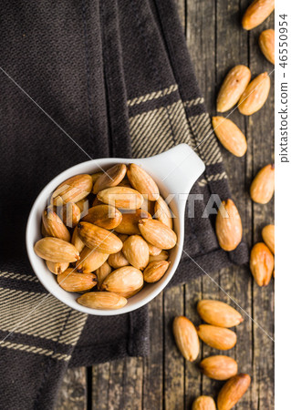 Salty roasted almonds. Salty roasted almonds. 46550954