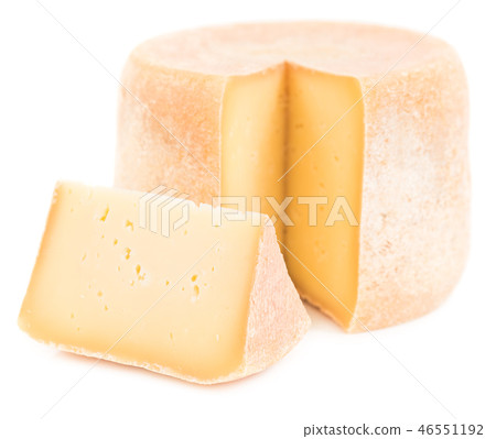 Cheese wheel with slice isolated on white 46551192