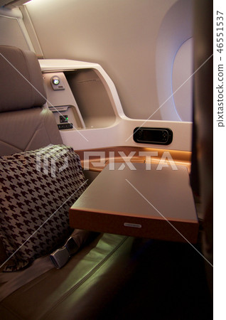 SINGAPORE - JULY 22, 2016: Business Class in a plane Airbus A350, working and eating table an 46551537