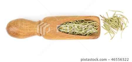 Dried rosemary or rosemarin leaves in wooden spoon isolated on white background top view Dried rosemary or rosemarin leaves in wooden spoon isolated on white background top view 46556322