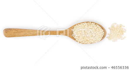 sesame seeds in a wooden spoon isolated on white background. Top view. Flat lay 46556336