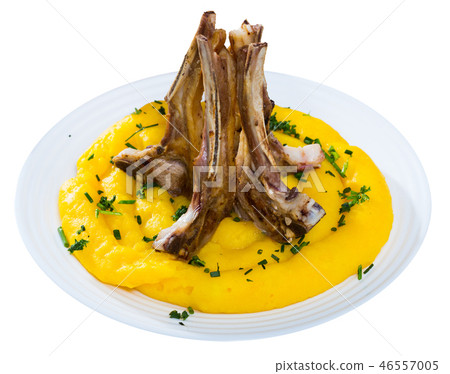 Tasty pinnekjott, lamb rib with mashed potato and greens, served at plate Tasty pinnekjott, lamb rib with mashed potato and greens, served at plate 46557005