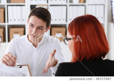 Businessman in shirt offer contract form Businessman in shirt offer contract form 46557067