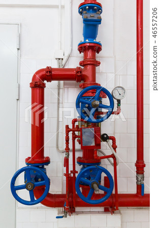Red pipeline with blue valves 46557206