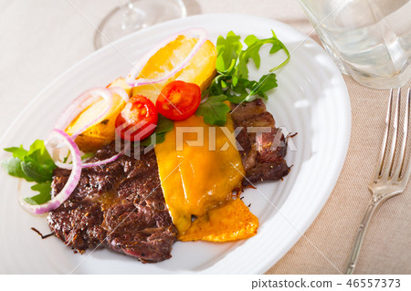 Well done roasted beef steak with cheese Well done roasted beef steak with cheese 46557373