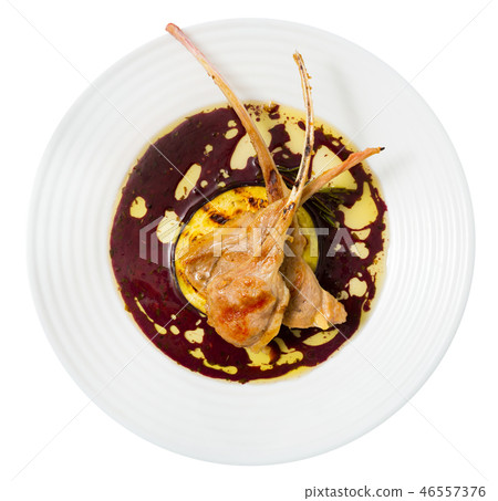 Lamb ribs with aubergine and wine sauce Lamb ribs with aubergine and wine sauce 46557376