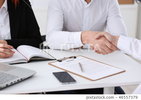 Partnership agreement closeup with man Partnership agreement closeup with man 46557379