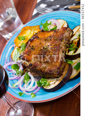 Roasted pork carre with vegetables 46557452