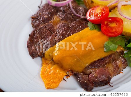 Well done beef loin fried with cheese Well done beef loin fried with cheese 46557453