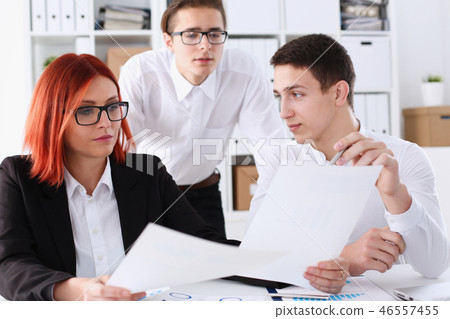 Group people sit in office deliberate on problem Group people sit in office deliberate on problem 46557455