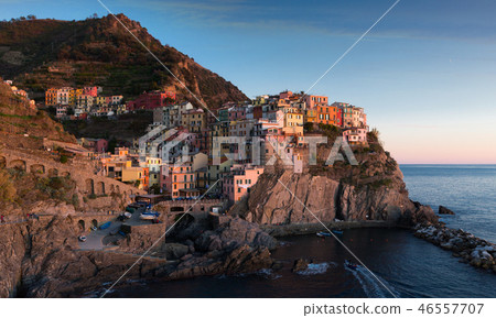 Manarola city La Spezia during sunset time on top of the hill Manarola city La Spezia during sunset time on top of the hill 46557707