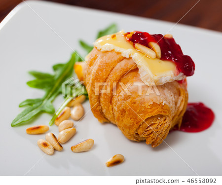 Camembert on mini croissant with jam, pine nuts Camembert on mini croissant with jam, pine nuts 46558092