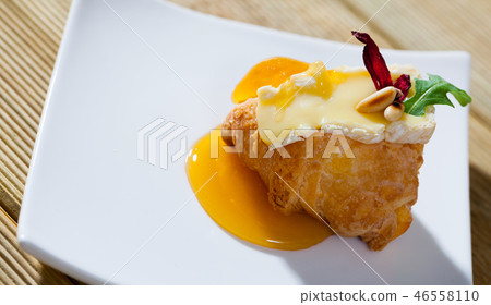 Croissant with camembert and honey Croissant with camembert and honey 46558110